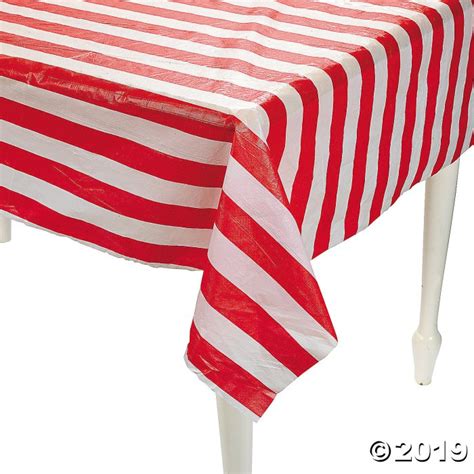 red and white striped plastic tablecloth roll  Mid-century white rectangular tablecloth with embroidered red blue stripes, 4 plain napkins